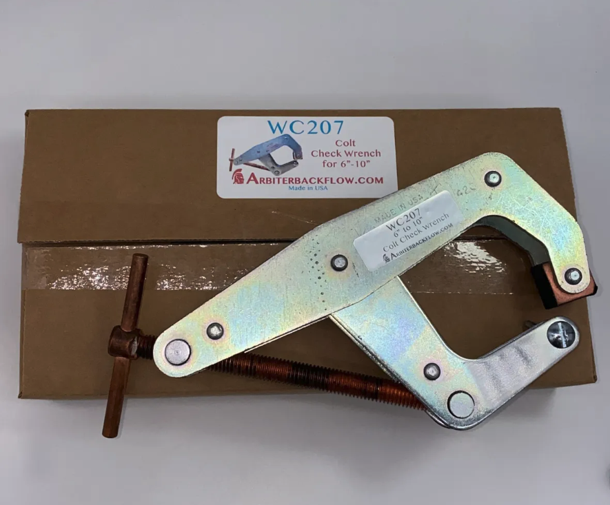 Tool for removing check valve compression disc on Ames and Watts backflow prevention assemblies